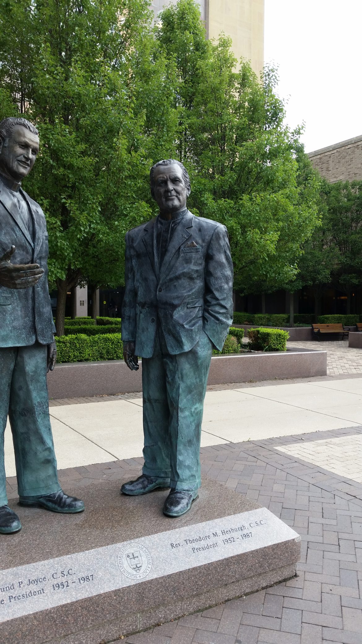 Statue of Rev. Theodore M. Hesburgh, C.S.C., in front of his namesake library.